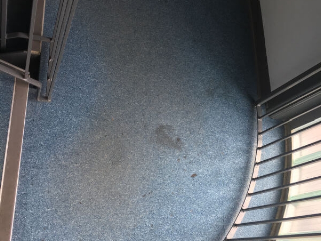 Communal stair carpet before being cleaned